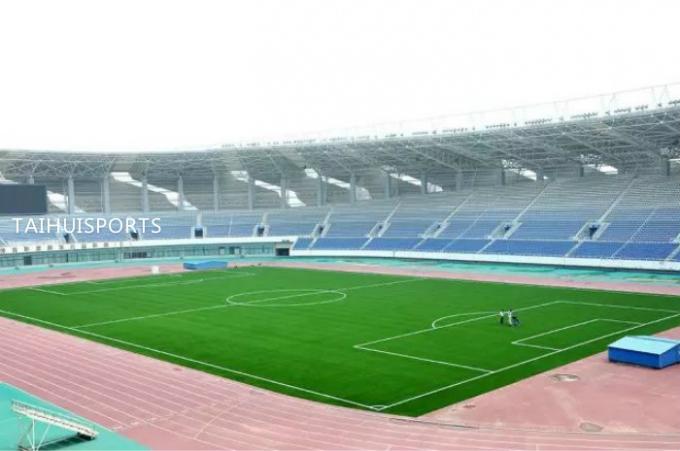 L'insonorisation synthétique d'assise d'herbe d'école, choc du football capitonne des biens